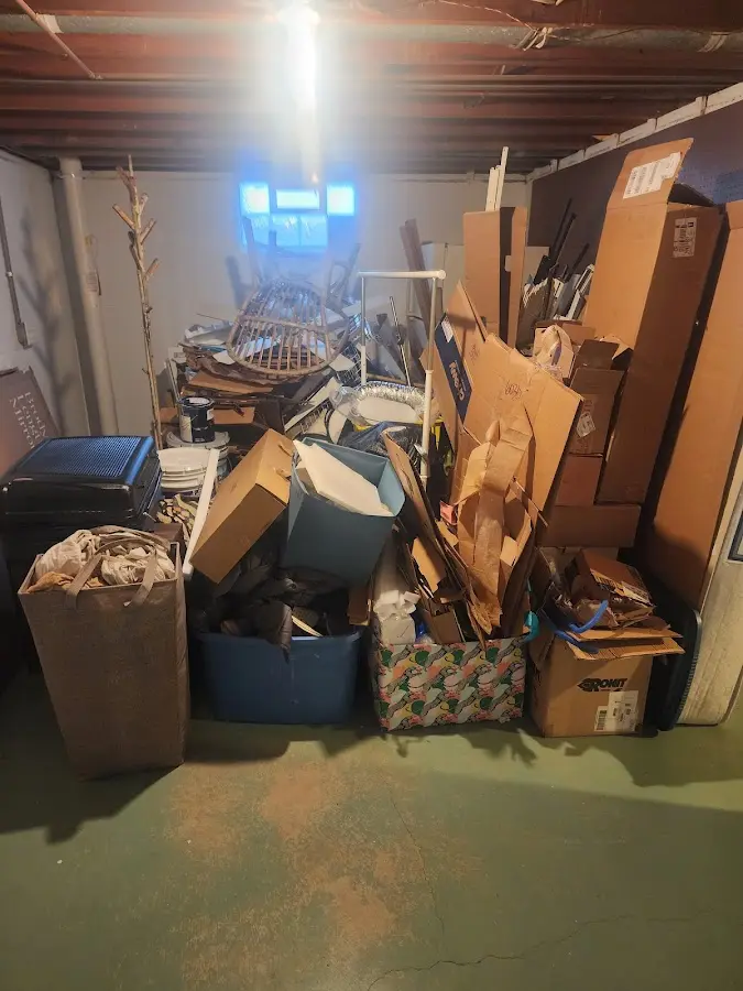 Roll-off dumpster container at job site for 20 Yard Dumpster Rental in Stockbridge